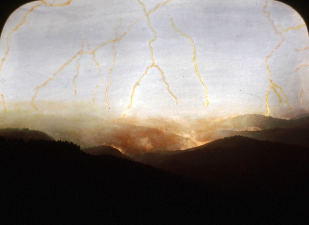 Lightning breaking across a dark sky