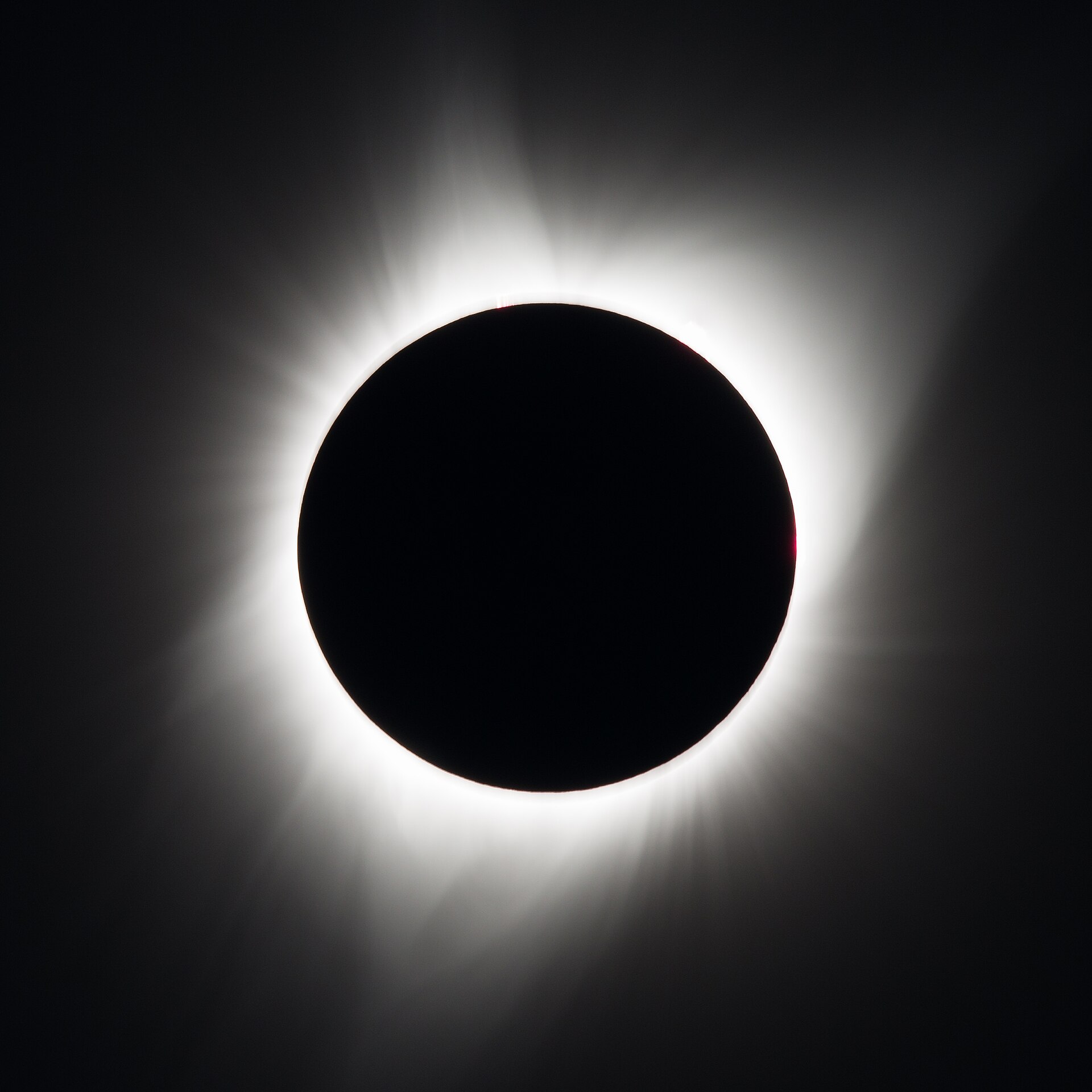 A total solar eclipse: void and light side by side